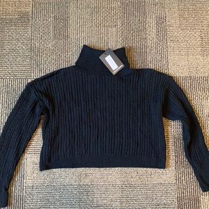 Black cropped cable kit turtleneck, size M